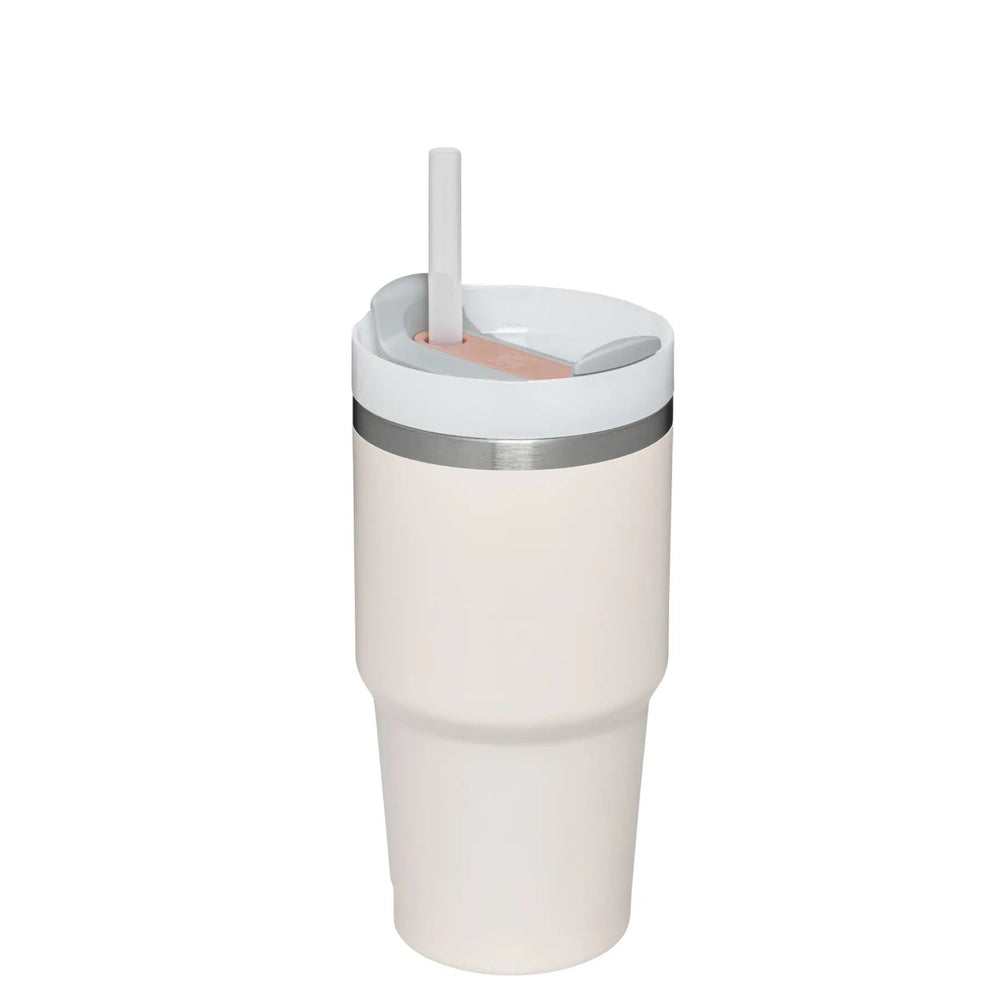 STANLEY The Quencher H2.0 Flowstate Tumbler 20 oz in white with straw lid, straw inserted for easy sipping.