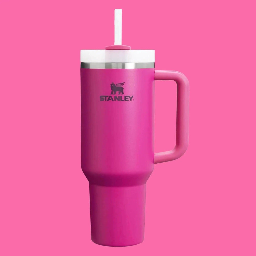 Stanley The Quencher H2.0 Flowstate Tumbler 30 oz in pink with white lid and straw, pink handle, ready for on-the-go sipping