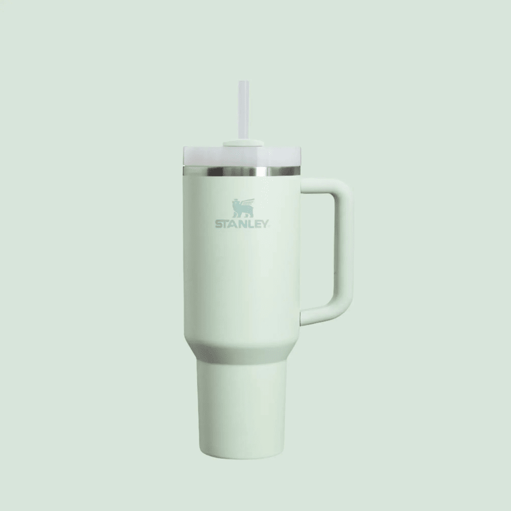 Stanley The Quencher H2.0 Flowstate Tumbler 40 oz mint green with straw, handle, and secure spill-resistant lid