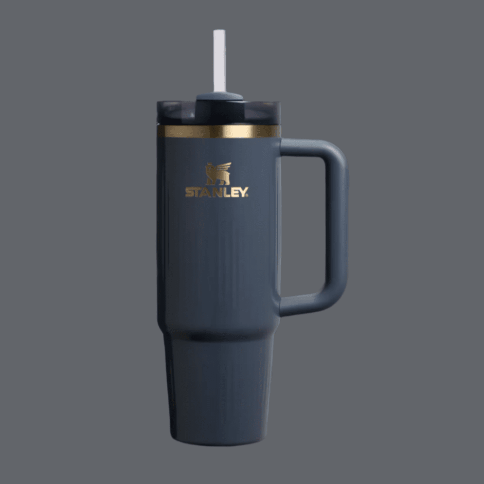 Stanley The Quencher H2.0 Fluted Tumbler 30 oz in navy with gold logo and straw lid