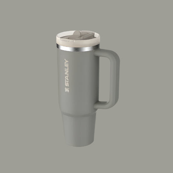 Stanley The Quencher Protour Flip Straw Tumbler 30 oz in gray, with handle and flip-top lid for on-the-go use.