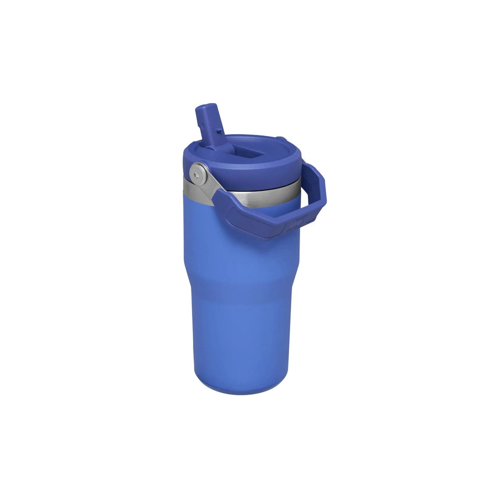 STANLEY The Wild Imagination Iceflow Flip Straw Tumbler 20 oz in blue, lid open with straw ready for sipping.