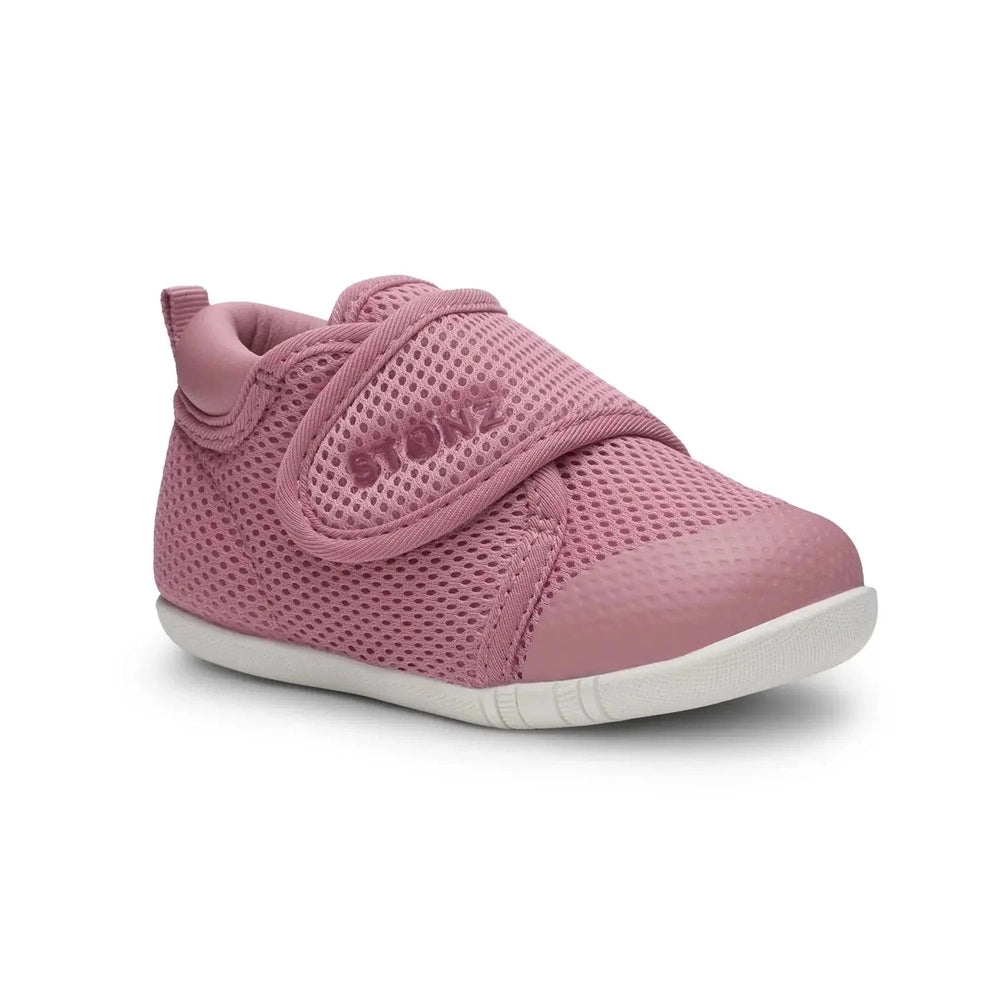 Stonz Cruiser Original Baby Shoes Dusty Rose, pink breathable mesh with Velcro strap secured on a toddler's foot.