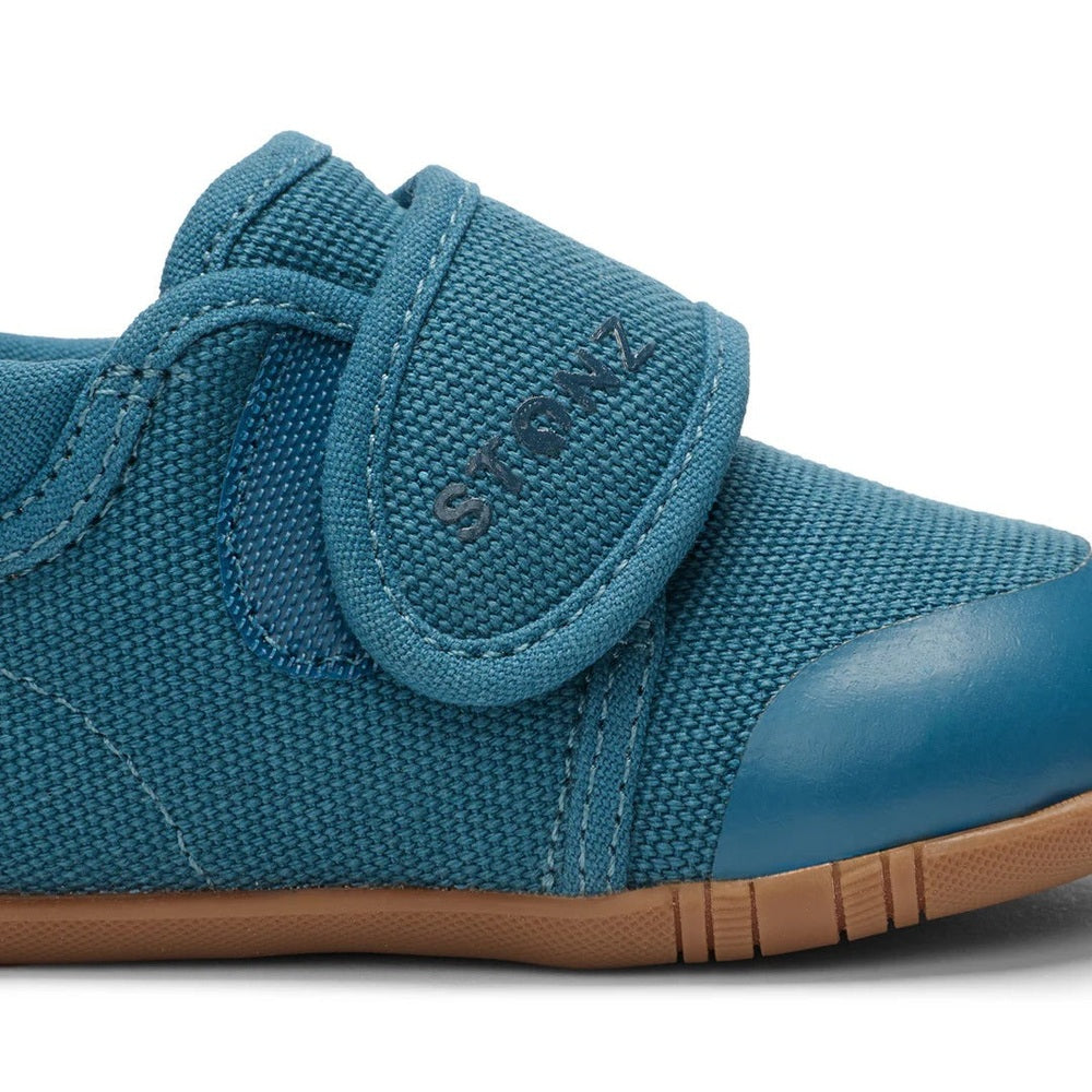 Stonz Cruiser Natural Baby Shoes Denim in blue denim with Velcro strap and tan sole, toddler-ready sneakers