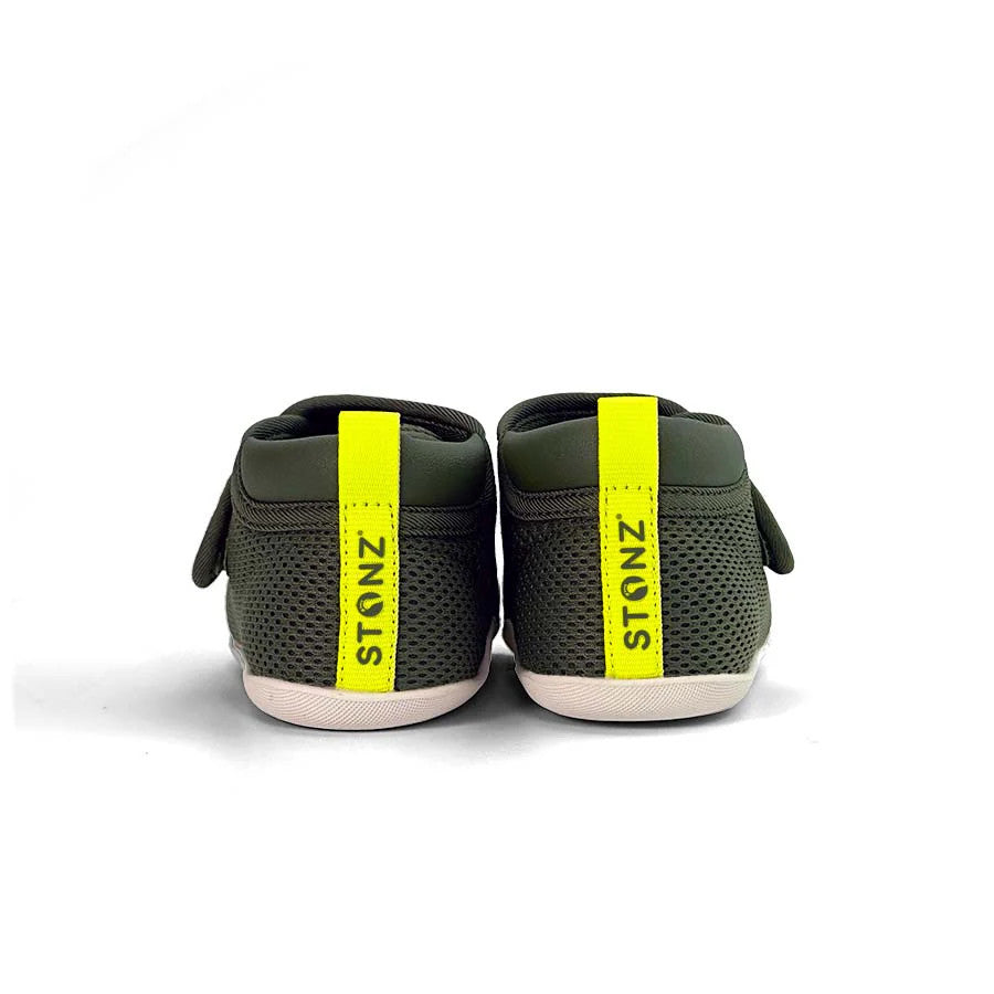 Stonz Cruiser Original Baby Shoes Cypress, pair of green mesh toddler sneakers with neon yellow heel tabs, rear view.