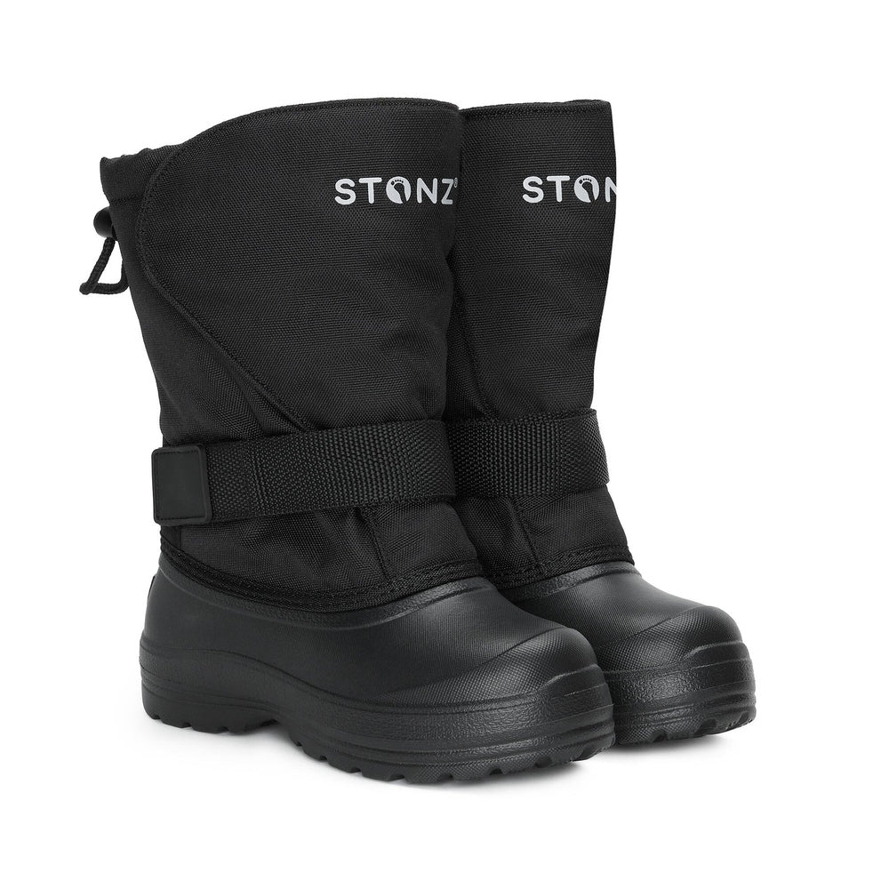 Stonz Trek Kids Snow Boots Black, pair shown with adjustable strap secured over rugged lug soles.