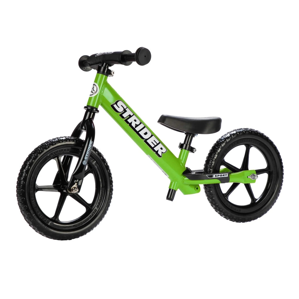 Strider 12 Sport balance bike, bright green frame with black wheels and saddle, pedals removed for balance