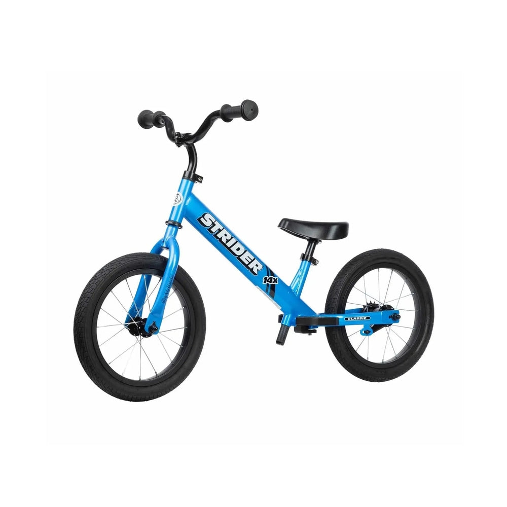 Strider 14X Classic Balance Bike in blue with black grips and saddle, showing thick tires and sturdy frame.