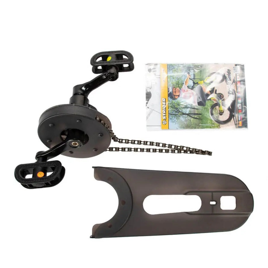 STRIDER Strider 14X Easy Ride Pedal Conversion Kit with black mounting plate, chain, and instruction manual.