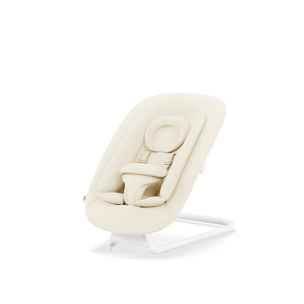 Studio product image of the Cybex Lemo 2 Bouncer in cream with padded 5-point harness and head pillow on a curved white base.