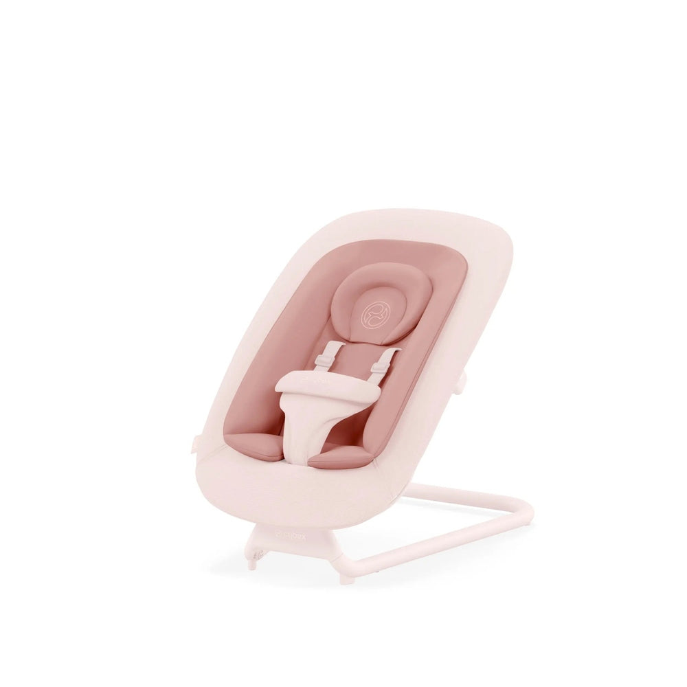 Studio product image of the Cybex Lemo 2 Bouncer with blush pink cushioned seat on white frame, gently rocking on curved base.