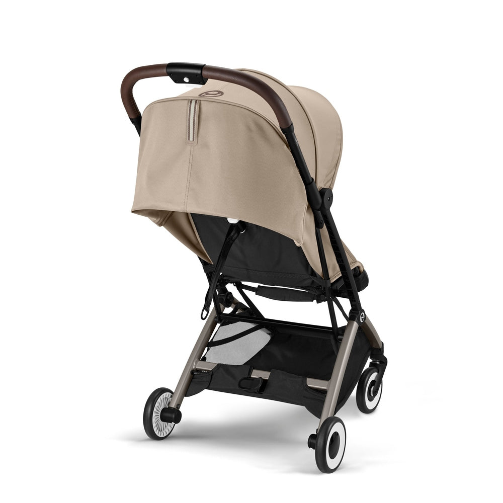 Studio product image of the Cybex Orfeo Compact Lightweight Travel Stroller in beige, rear three-quarter view.