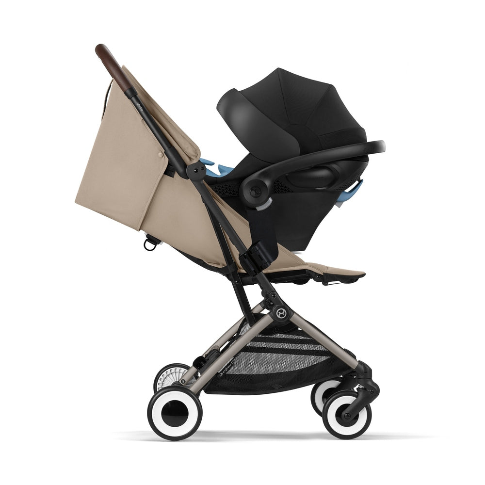 Studio product image of the Cybex Orfeo stroller with black infant car seat attached, side view.