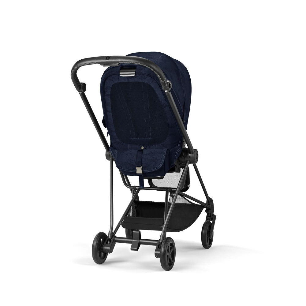 Studio product image of the Cybex Platinum Mios 3 Stroller Rebellious Luxury Denim Blue denim-blue Cybex MIOS 3 stroller, denim fabric seat, black frame, four wheels, under-seat basket.