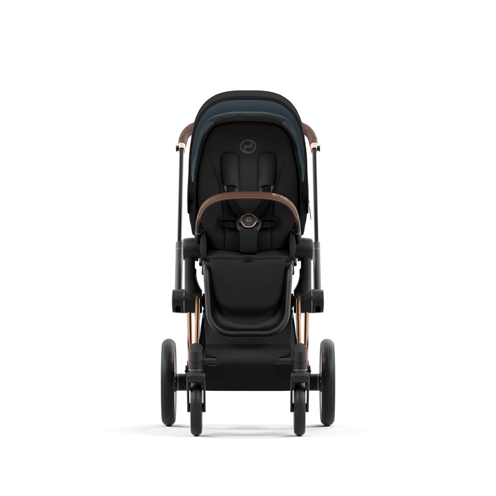 Studio product image of the Cybex Platinum Priam 4 Luxury Stroller One Box Pack in Sepia Black with Rose Gold Brown frame, front view on white background.