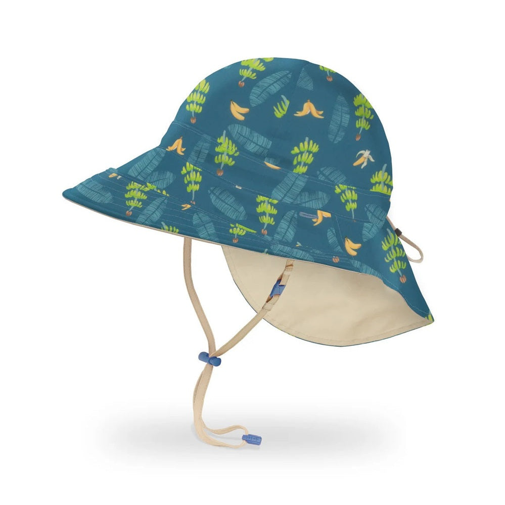 Sundancer reversible hat by Sunday Afternoons, Banana Split/Birch blue tropical print with beige underside, size M/L