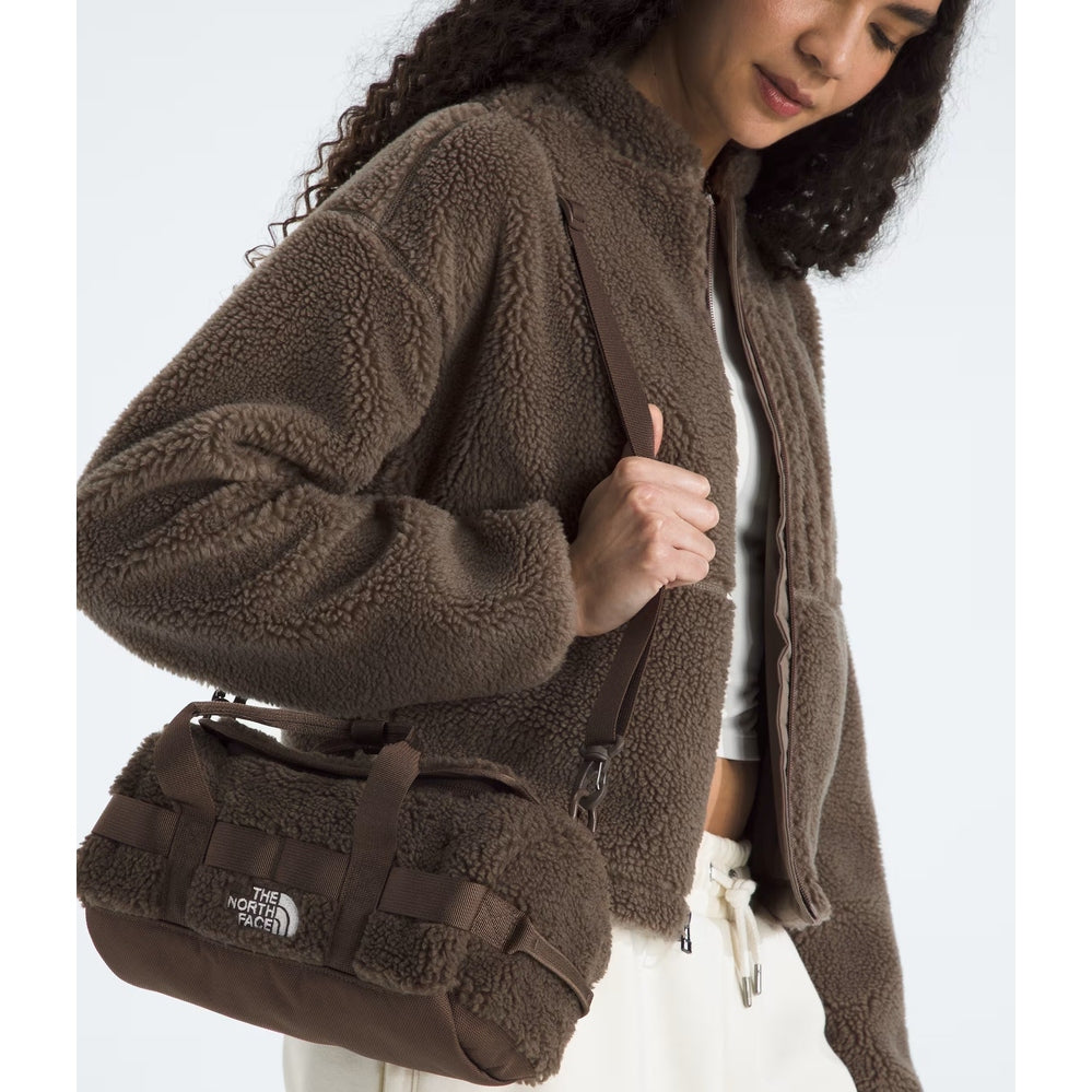 The North Face Base Camp High Pile mini bag in brown fleece, with adjustable strap and logo