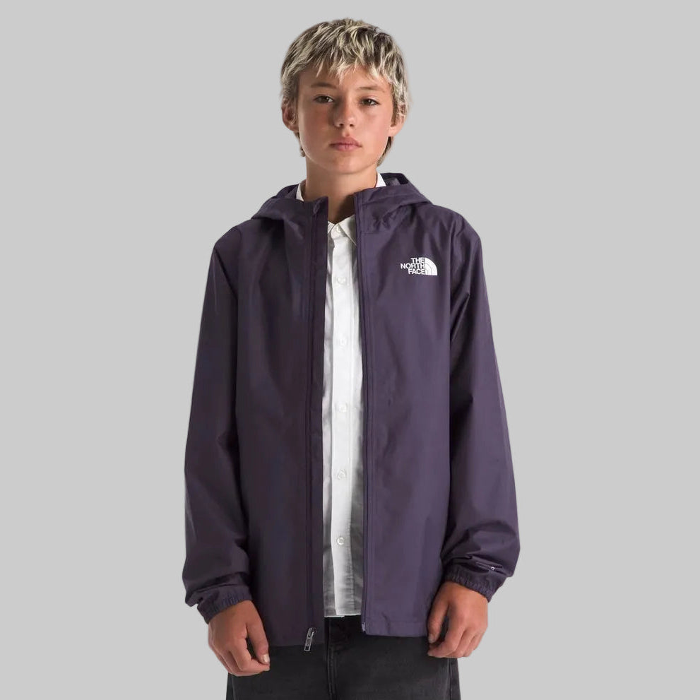 The North Face Zipline Rain Jacket in Purple, front view on a child wearing a white shirt.