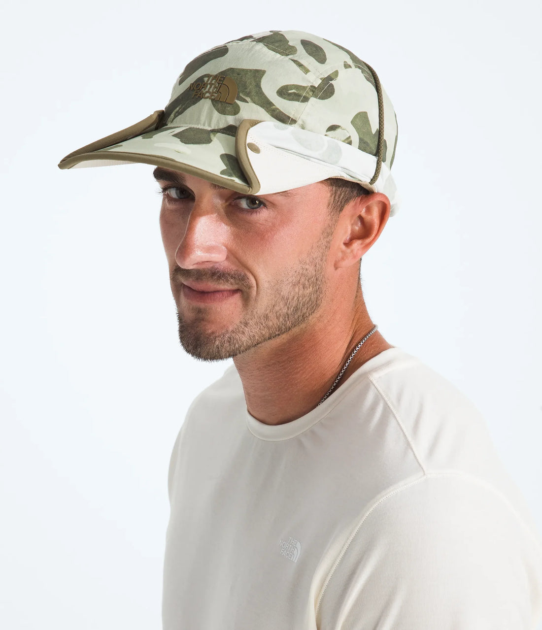 The North Face Class V Convertible Sunshield - Cedar Heritage Print/Cedar - model wearing the ball-cap configuration