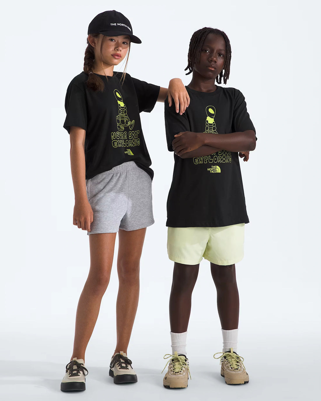 The North Face Kids' Celestial Drift Tee in TNF Black — two-model full-length front view
