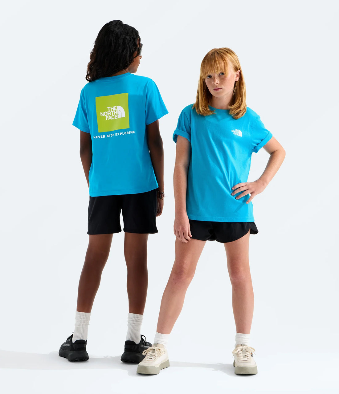 The North Face Teens' Evolution Box NSE T-Shirt - Meridian Blue - models showing front and back graphics