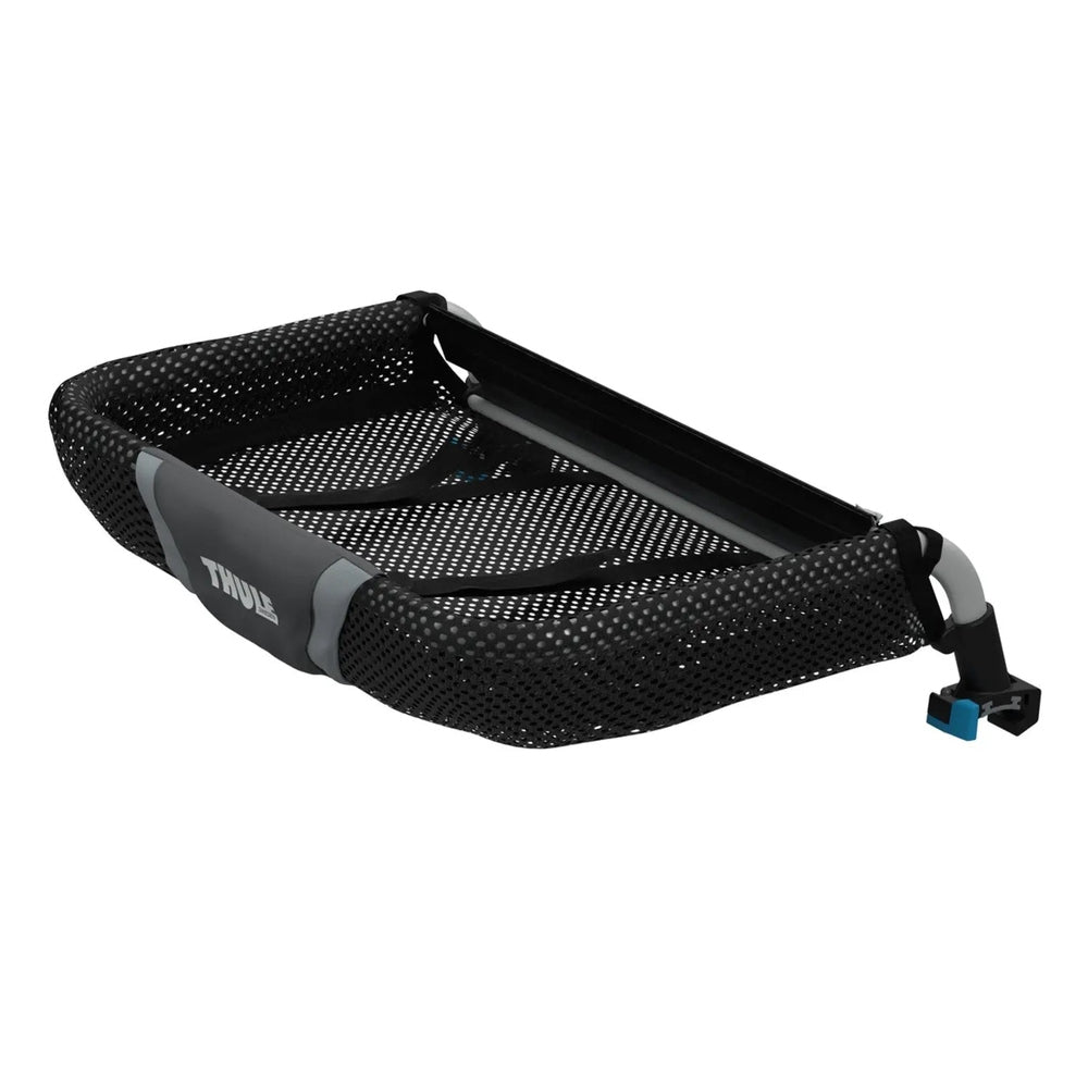 Thule Cargo Rack basket in black mesh with gray frame, mounted on a stroller for extra storage.