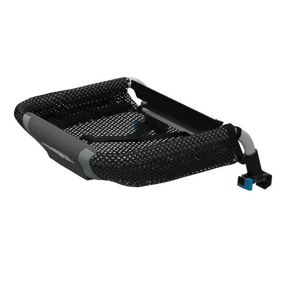 Thule Cargo Rack stroller basket in black mesh with gray frame, attached to a stroller for extra storage.