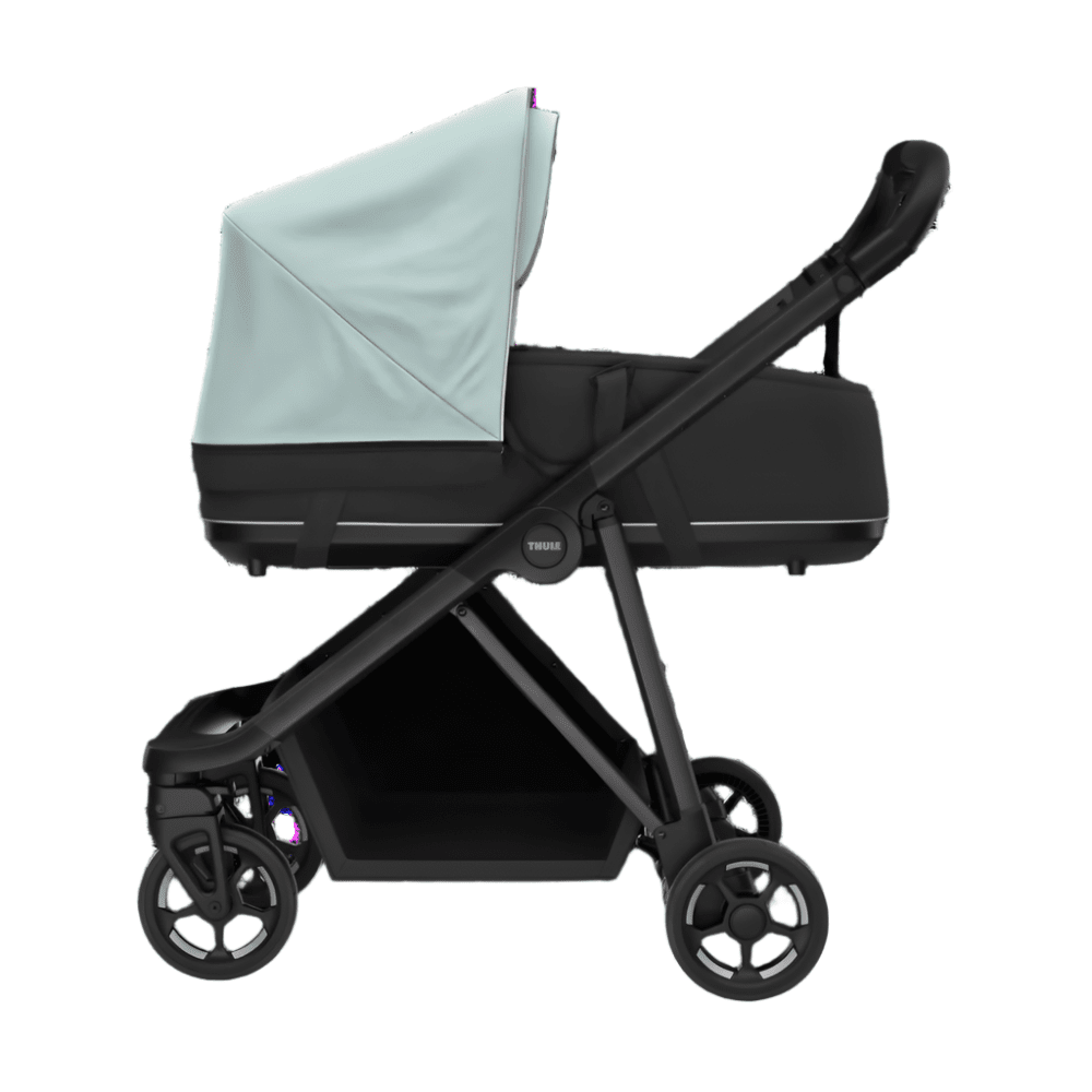Thule Shine stroller with bassinet, light blue canopy, black frame and wheels