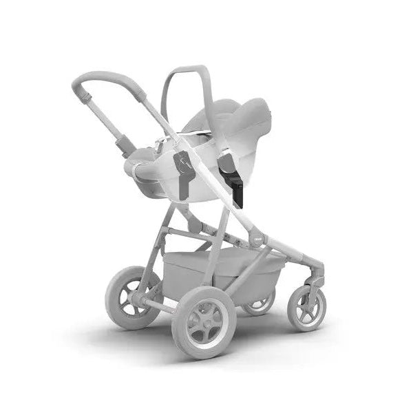 Thule Sleek Car Seat Adapter Sleek Black attached to a stroller, securing a car seat for easy outings.