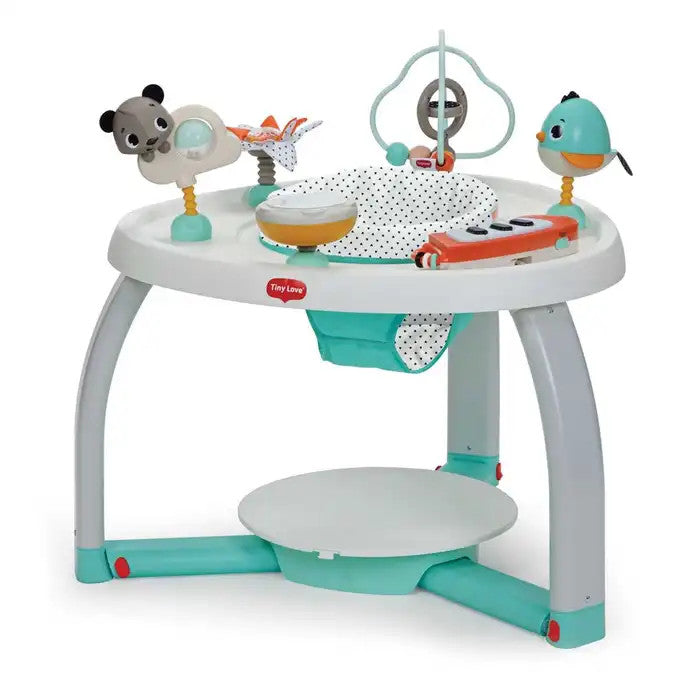 Tiny Love 5-In-1 Here I Grow Stationary Activity Center with teal accents; round play surface features hanging toys.