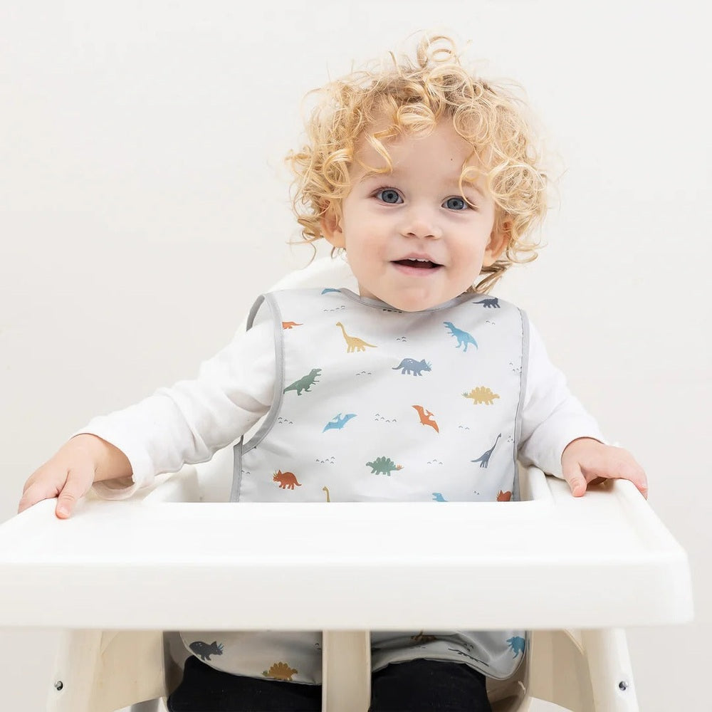 TINY TWINKLE Tiny Twinkle Mess-Proof Apron Bib 6-24M Dinosaur print with grey contrast binding img 2/15