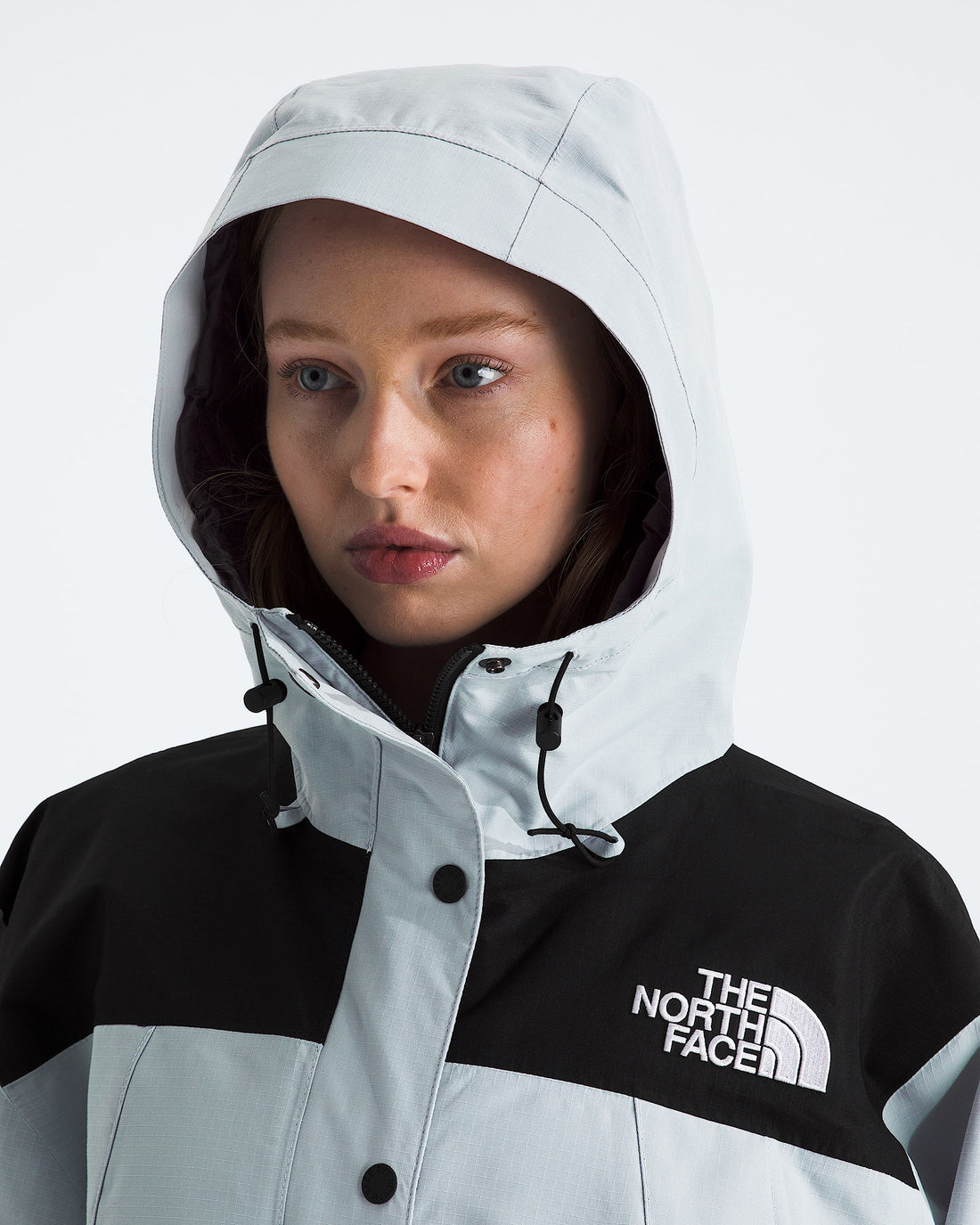 The North Face Women’s DRYVENT Mono Mountain Jacket, Frost Grey/TNF Black – Hood detail on model