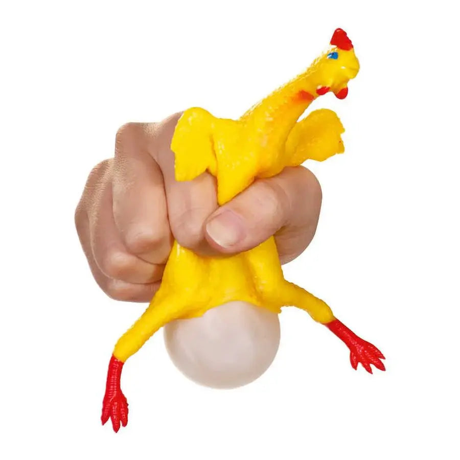 TOBAR egg-laying rubber chicken squeeze toy in bright yellow with red feet, holding a white egg