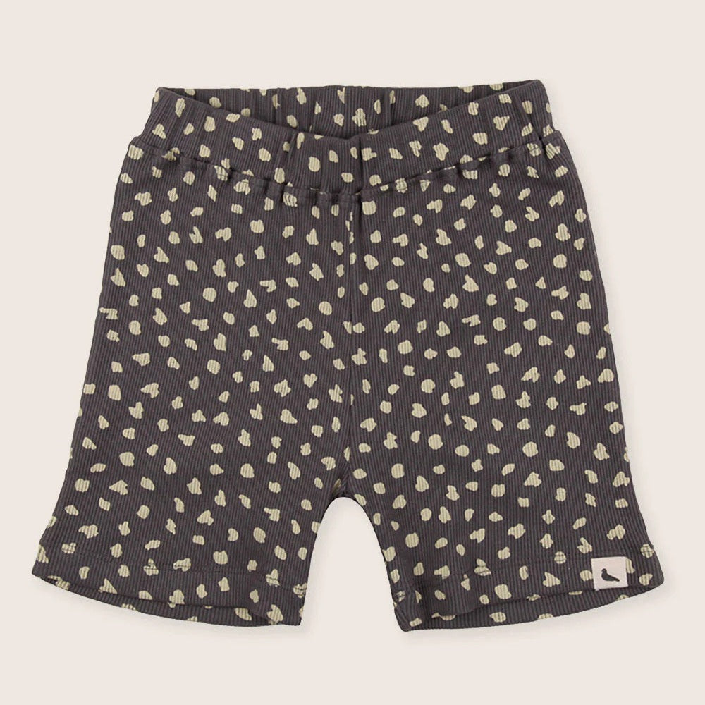 Turtledove London Animal Print Short Set Charcoal shorts laid flat with an elastic waistband and cream spots.