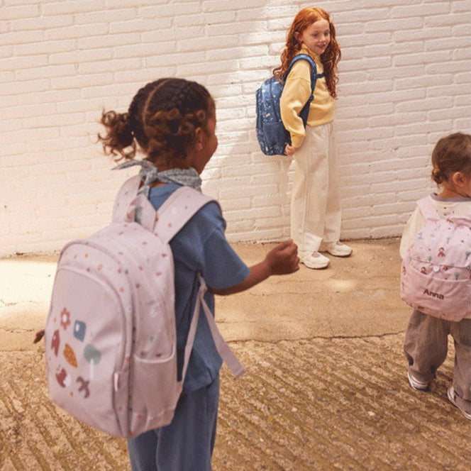 Tutete Kids Medium Backpack pink with colorful shapes; two school backpacks shown.
