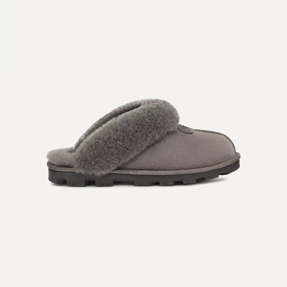 UGG Coquette in Grey, outer side view with sheepskin cuff