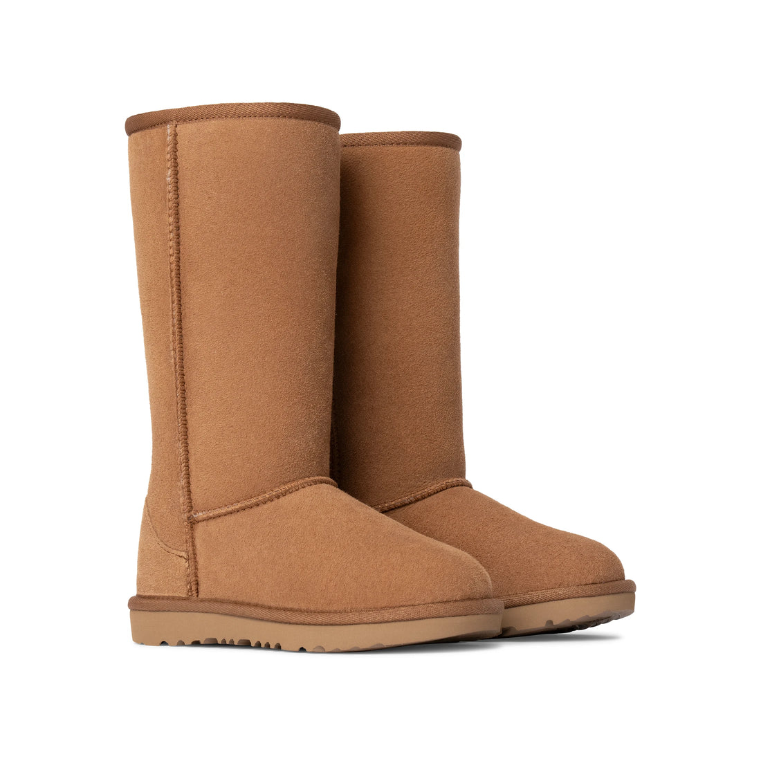 Pair of UGG Kids' Classic Tall II Chestnut boots in front three-quarter view
