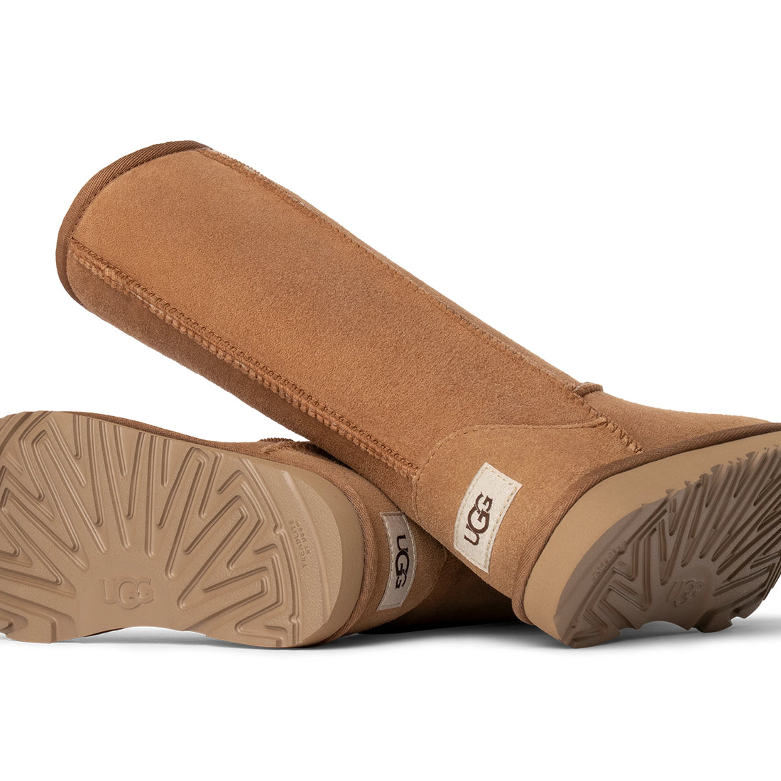 UGG Kids' Classic Tall II Chestnut boots showing the outsoles and heel labels