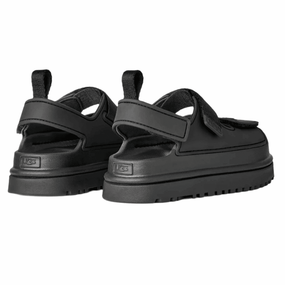 UGG Kids Goldenglow sandals, black pair with adjustable Velcro straps and cushioned sole