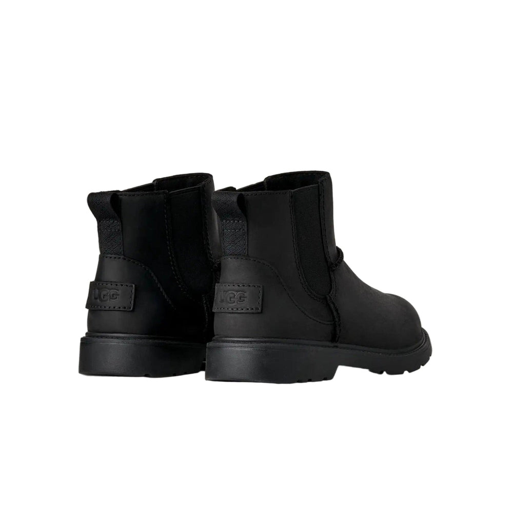 UGG Kids' Perry Weather Chelsea Black boots; back view shows elastic sides and pull tabs for easy on.