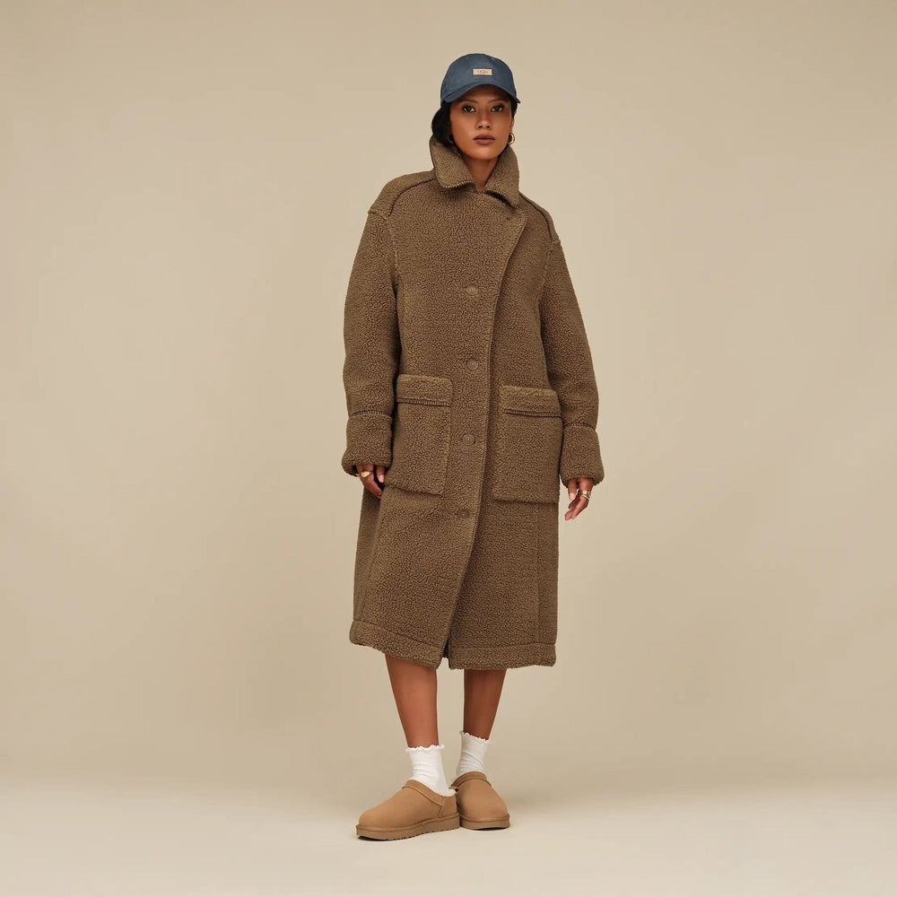 UGG Women's Classic Micro Chestnut worn by a model in a brown teddy coat and tan loafers.