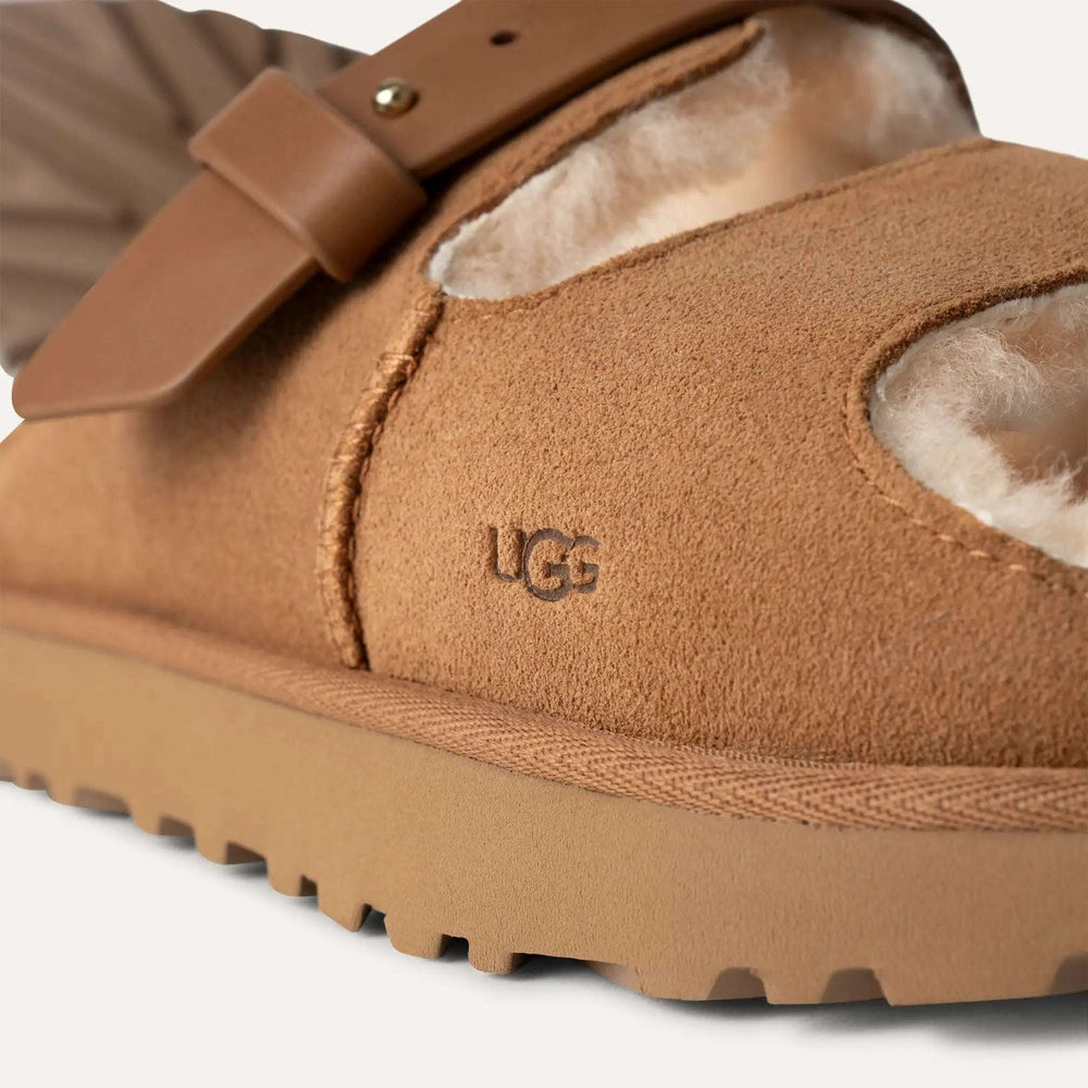 UGG Greenport Strap Slide in chestnut suede with shearling lining and buckle strap
