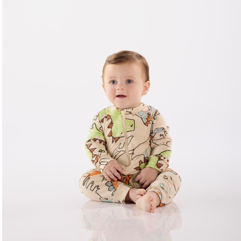 UP BABY soft jersey cotton boys jumpsuit with beige base, dinosaur print and green accents