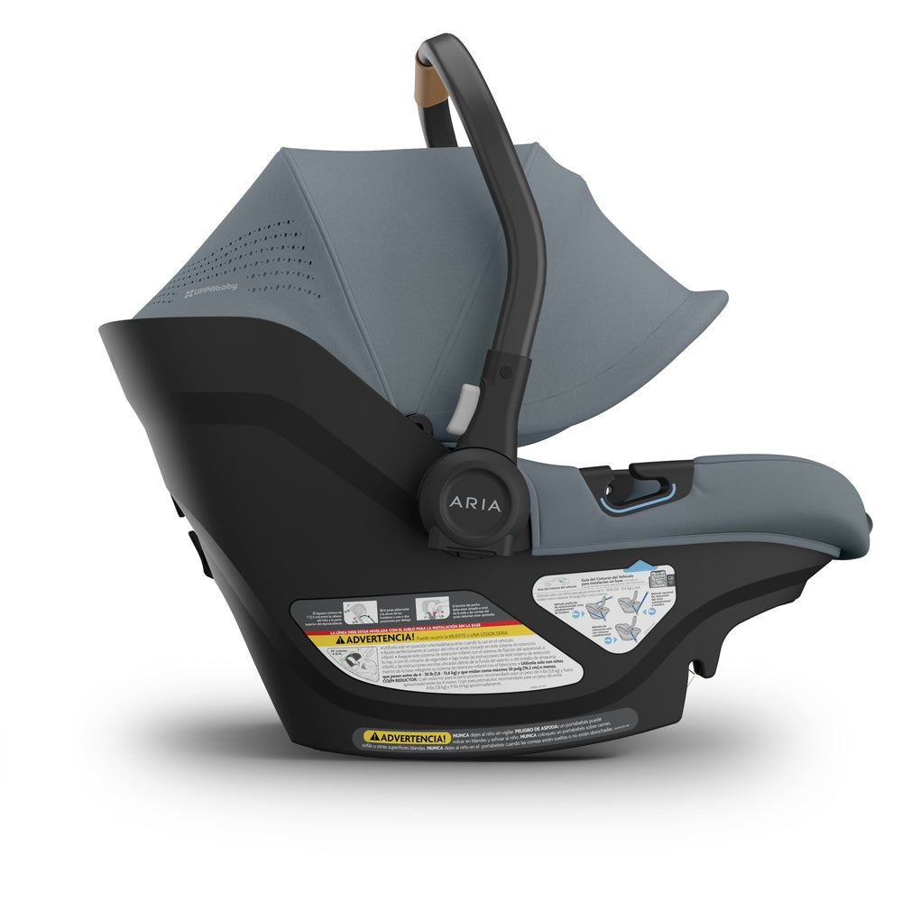 Uppababy Aria V2 Car Seat in Blue-Gray fabric with black base, side view.