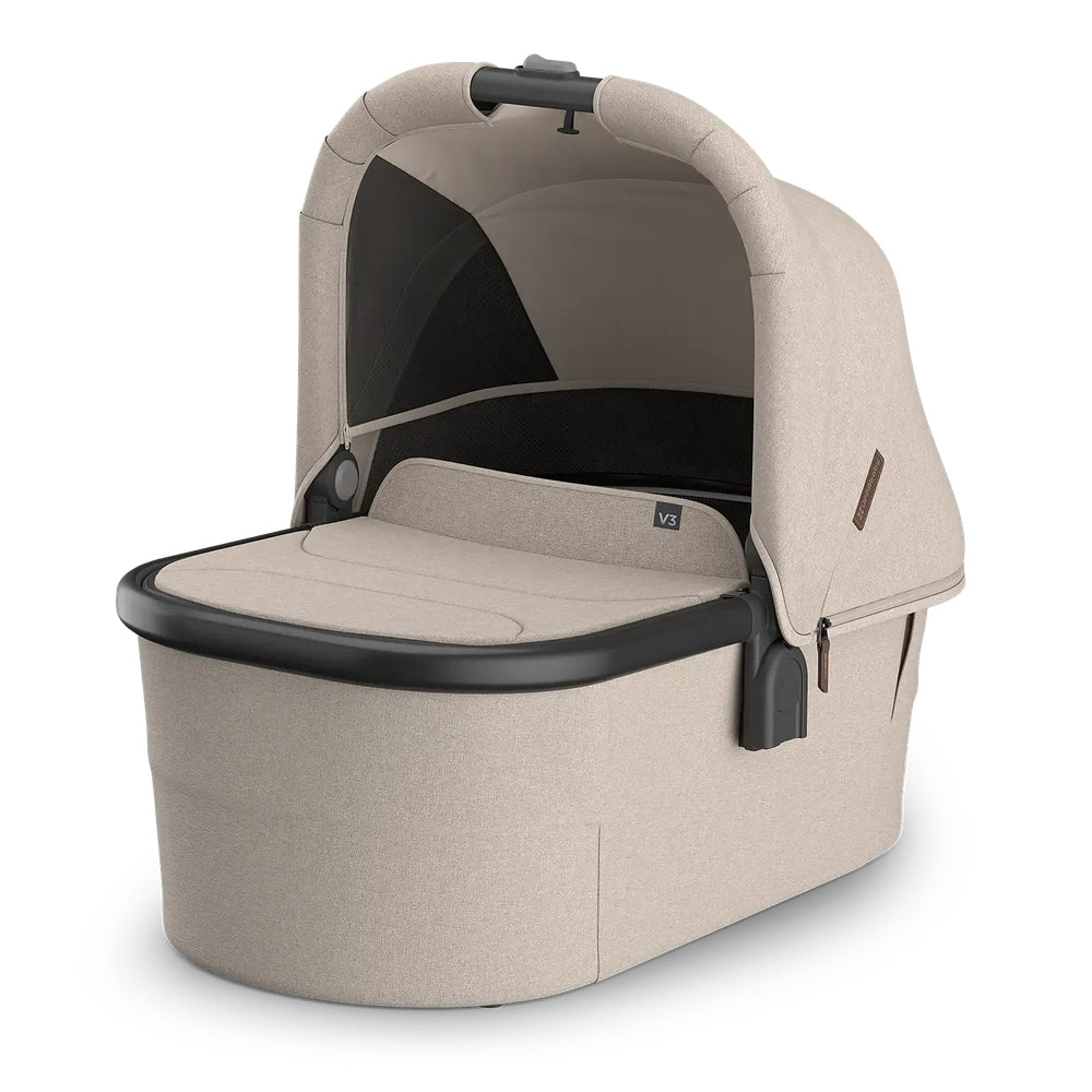 UPPAbaby Bassinet V3 front three-quarter view with canopy extended and apron attached