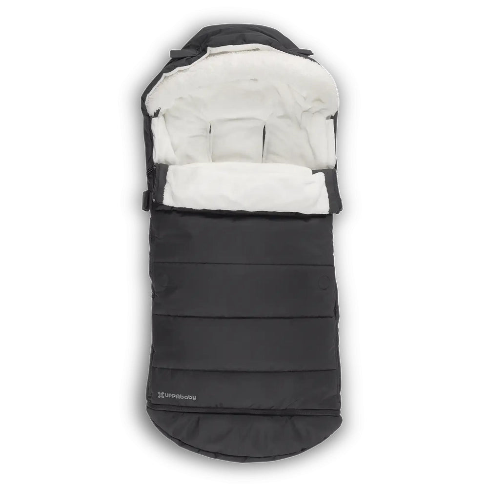 UPPAbaby Cozy Ganoosh stroller footmuff in black with white plush lining, keeping baby warm.