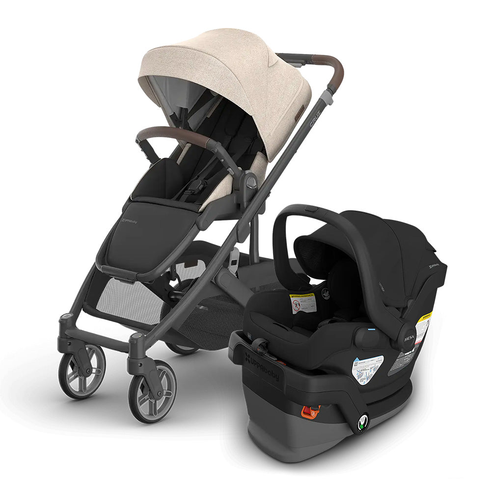 UPPABABY Cruz V3 Stroller + Mesa V3 Infant Car Seat Travel System in beige, with the car seat snapped onto the frame.
