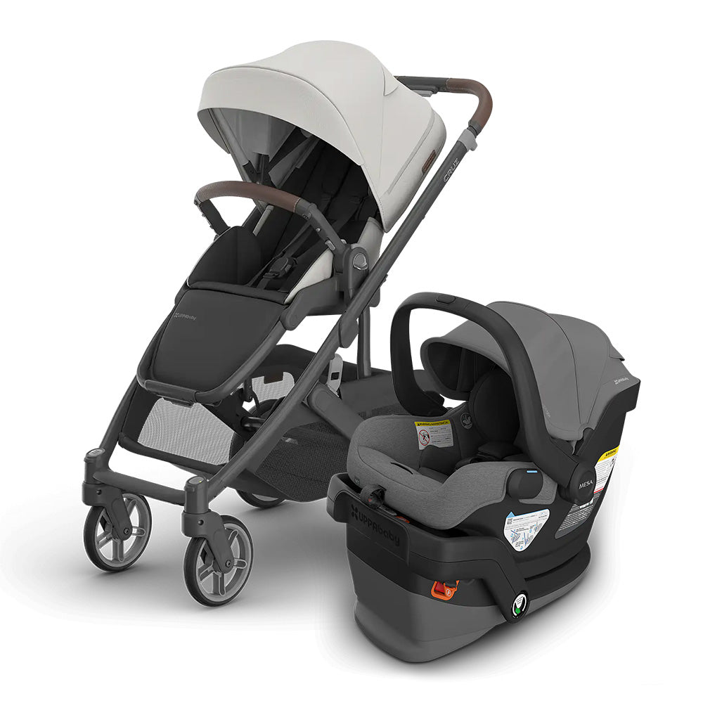 UPPABABY Cruz V3 Stroller + Mesa V3 Infant Car Seat Travel System in gray, with seat attached and canopy extended.