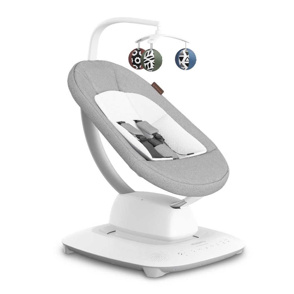 Uppababy Mamaroo Smart Swing, gray fabric seat on white base with three patterned hanging toys