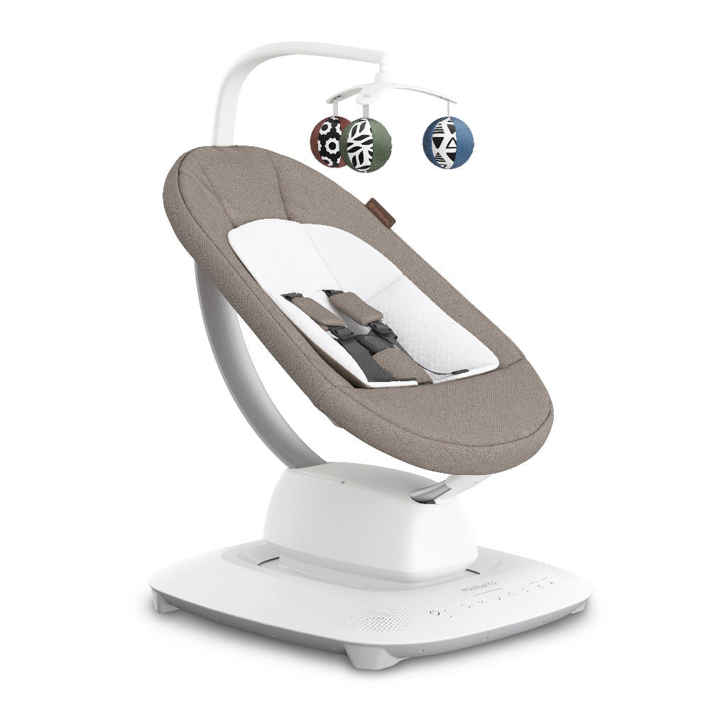Mamaroo Smart Swing by Uppababy, beige fabric seat with white interior and hanging toys